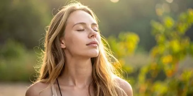 Woman finding calm outdoors to manage stress