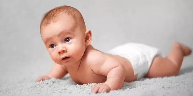 FeaturedImage-baby-on-soft-surface-tummy-time-development.jpg