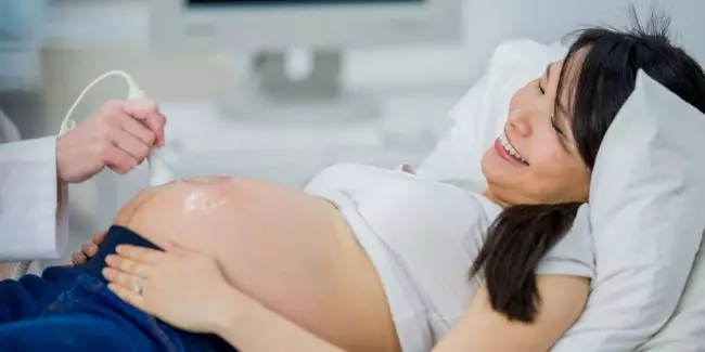 Pregnant woman at prenatal care visit