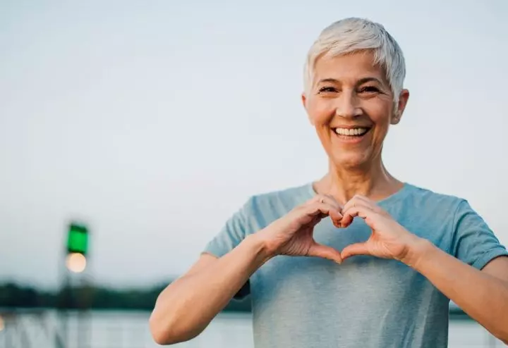 Older woman smiling making her health a priority