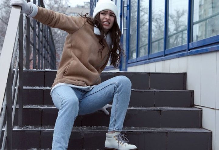 Icy outdoor stairs causing a winter slip and fall hazard