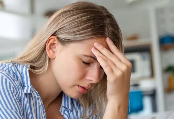 Woman-experiencing-sinus-pressure-and-facial-pain-from-congestion-at-home.jpg