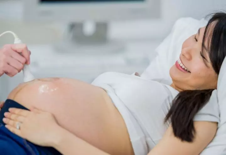Pregnant woman at prenatal care visit