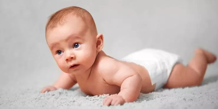 FeaturedImage-baby-on-soft-surface-tummy-time-development.jpg