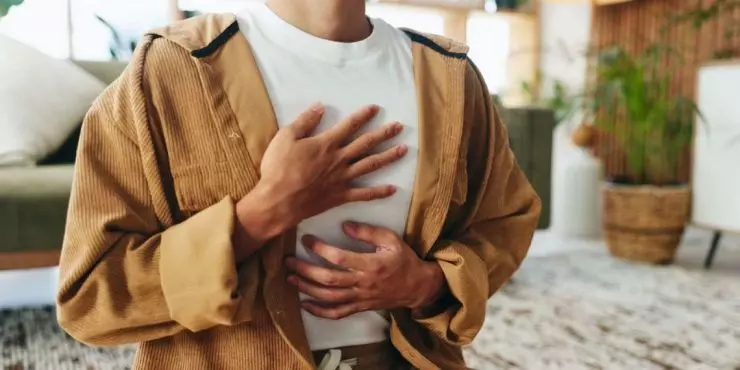 Mom taking a moment to relax by breathing