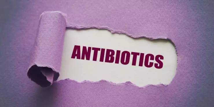 Antibiotics text on purple background