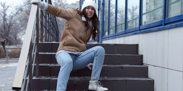 Icy outdoor stairs causing a winter slip and fall hazard