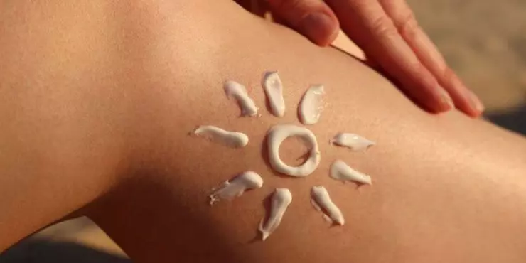 Sunscreen-applied-to-skin-in-sun-shape-showing-how-much-SPF-coverage-is-needed-for-skin-cancer-prevention.jpg