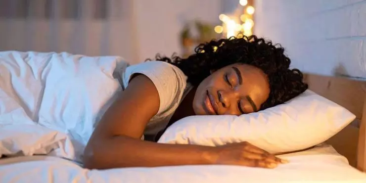 Woman-getting-quality-sleep-at-night-as-the-first-priority-of-a-spring-health-reset.jpg