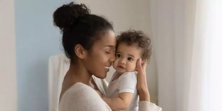 Image4-mother-holding-baby-smiling-bonding.jpg