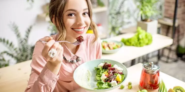 Woman-Eating-Salad-With-Boosted-Energy.jpg