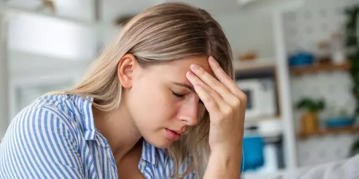 Woman-experiencing-sinus-pressure-and-facial-pain-from-congestion-at-home.jpg