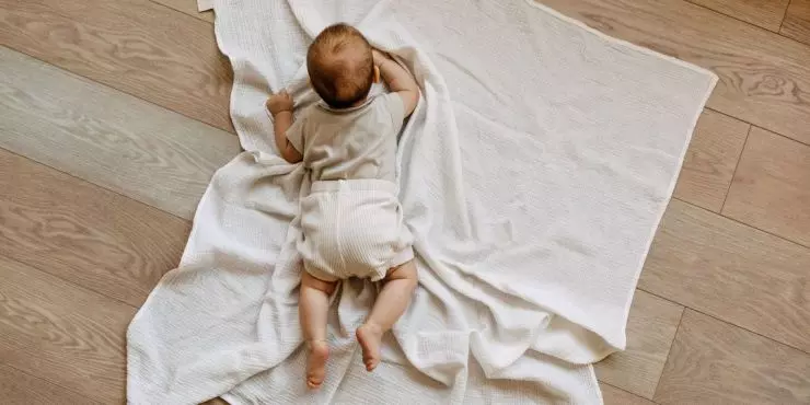 Image1-baby-on-white-blanket-during-tummy-time.jpg