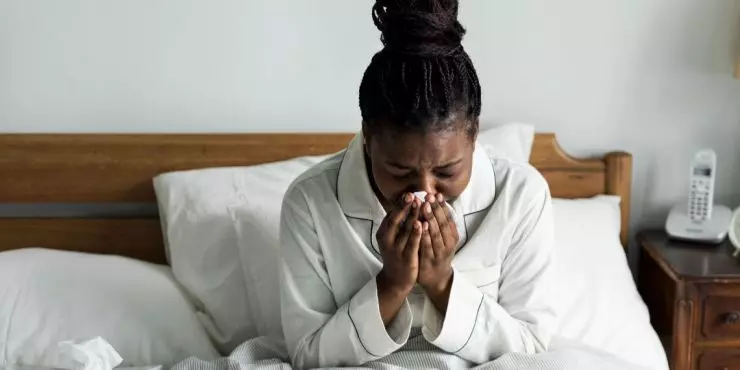Image2-woman-sick-in-bed-with-tissues.jpg