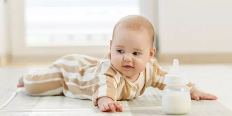 Baby tummy time on floor